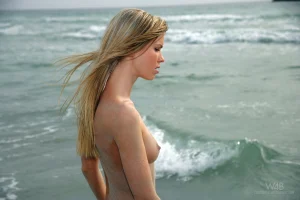 08-blonde-nudist-on-the-sand-beach