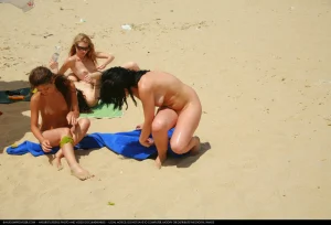 05-shiny-nudist-on-the-beach